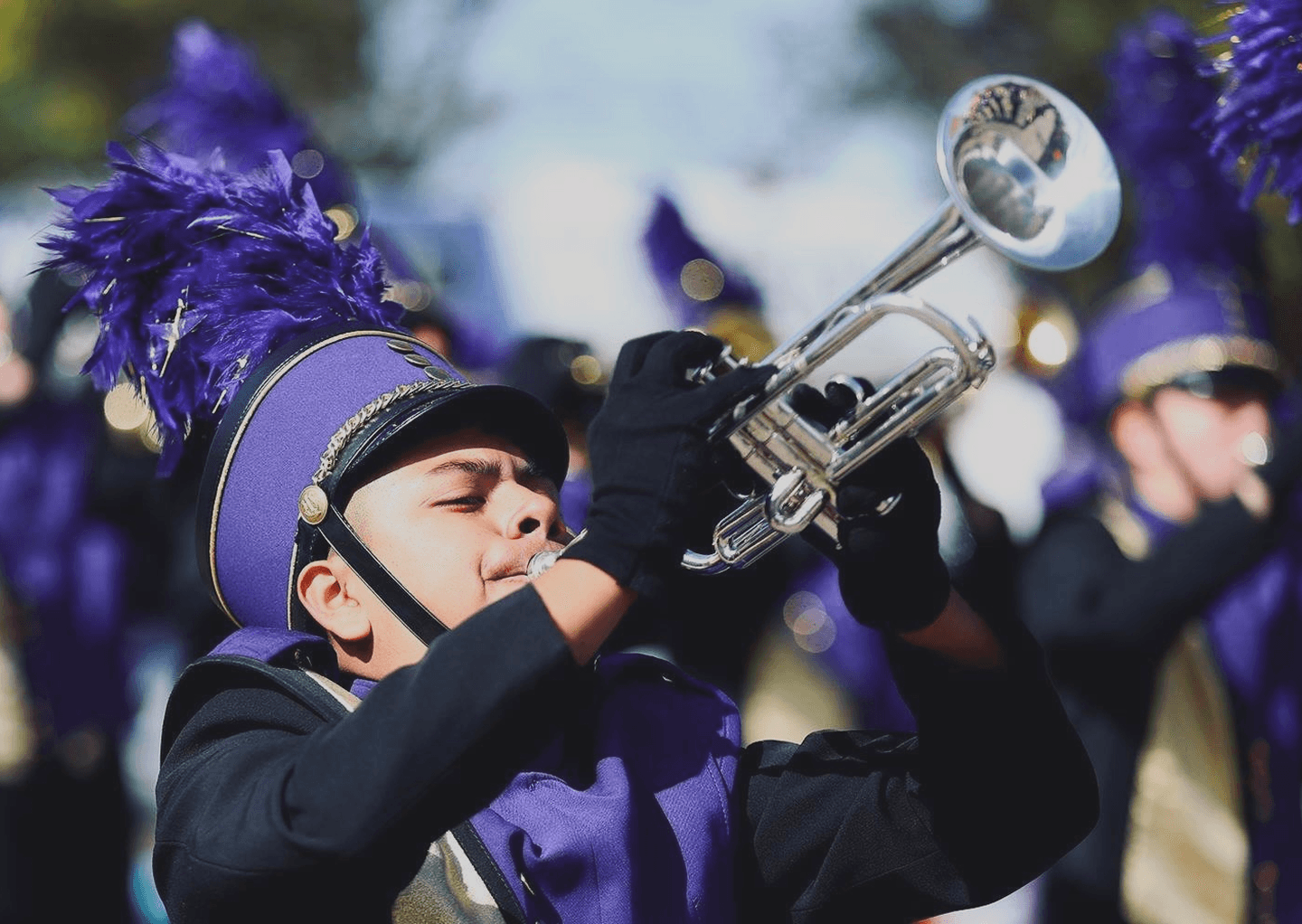 Abraham Lopez-Ramirez performing trumpet in marching band